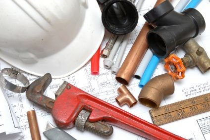 Plumbing parts, tools, and plans used by NC Green Plumbing & Rooter LLC.