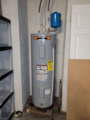 Water heater plumbing by NC Green Plumbing & Rooter LLC